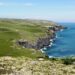 Couple enjoying a scenic UK coastal walk.