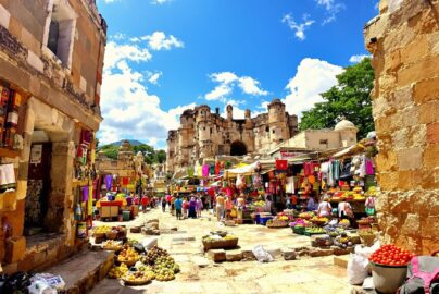 Ancient ruins and colorful market in a sunny foreign land.