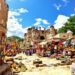 Ancient ruins and colorful market in a sunny foreign land.