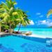 Tropical villa with pool and beach.