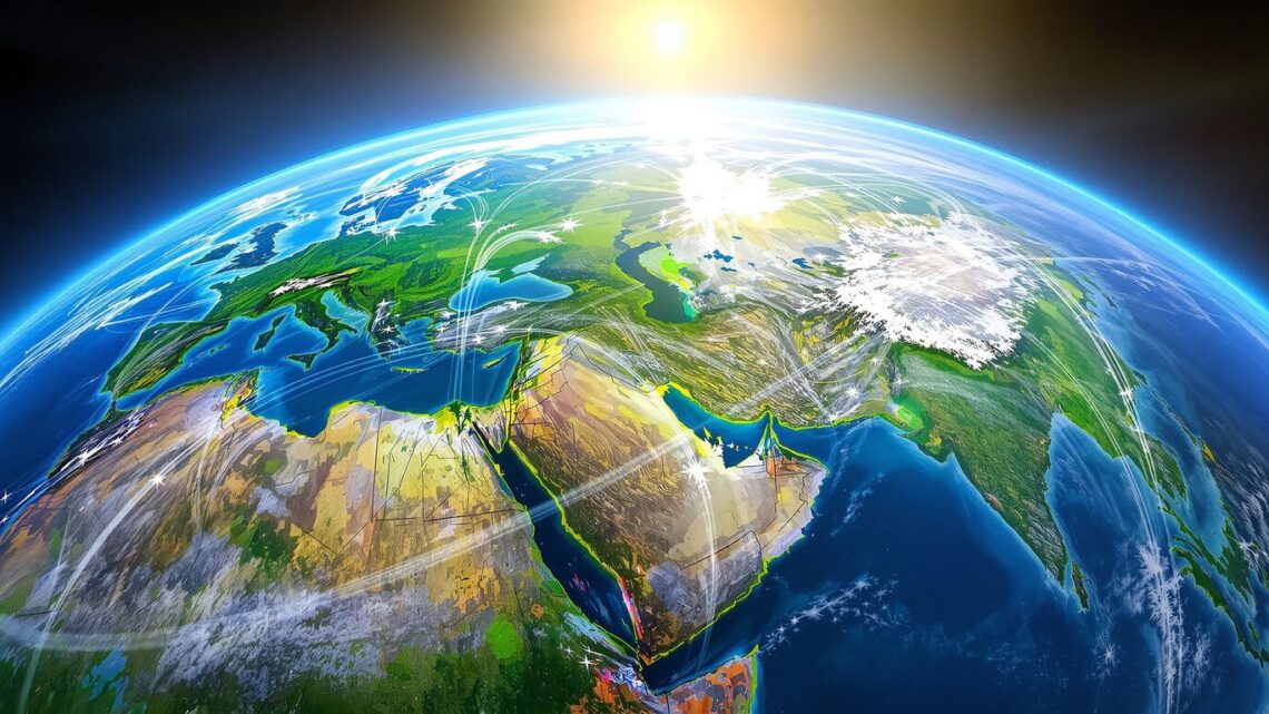 Globe with airplane trails and sunlight.