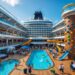 A large cruise ship deck with people enjoying swimming, dining, and climbing activities under a clear blue sky on calm ocean waters.