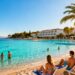 Croatian resort beach with pools and relaxing guests