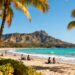 Beautiful September beach with clear sky and few tourists