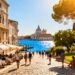Beautiful European city with historic buildings and water.