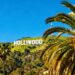 Hollywood sign with palm trees and blue sky