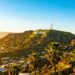 Hollywood sign overlooking Los Angeles cityscape
