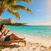 Couple enjoying cocktails on a tropical beach vacation.