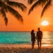 Tropical beach sunset with couple enjoying the view.