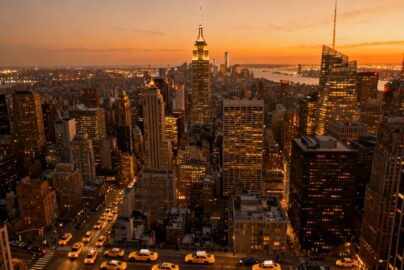 New York City skyline with Empire State Building at dusk.