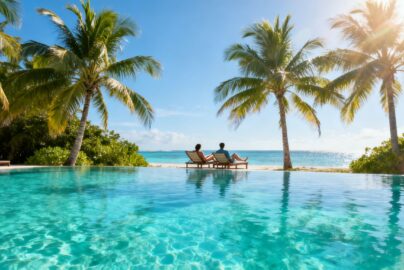 Couple relaxing on a sunny beach in December.