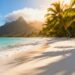Tranquil beach with palm trees and clear blue water.