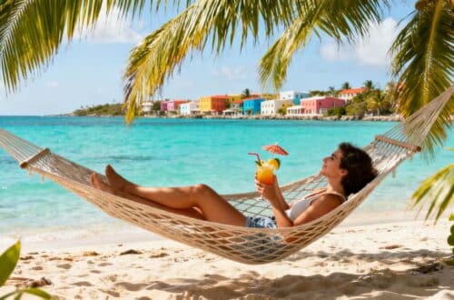 Tropical beach with hammock and ocean view.